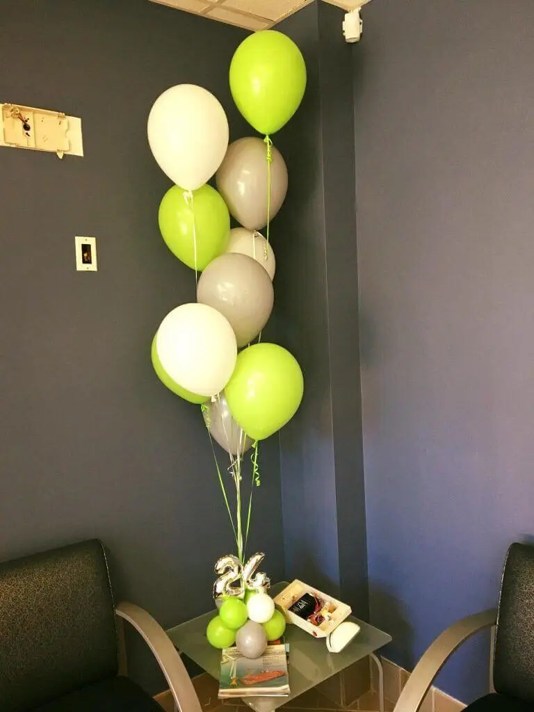 Lime green, gray, and white latex balloons with mini number 24th balloons column from Balloons Lane Balloon delivery in New York City.