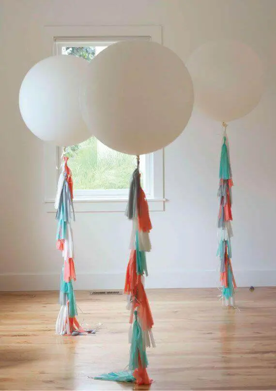 round jumbo white organic balloons with silver orange and teal tassel