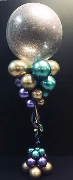 Column of chrome gold, chrome green, and chrome purple latex balloons delivered by Balloons Lane in Manhattan