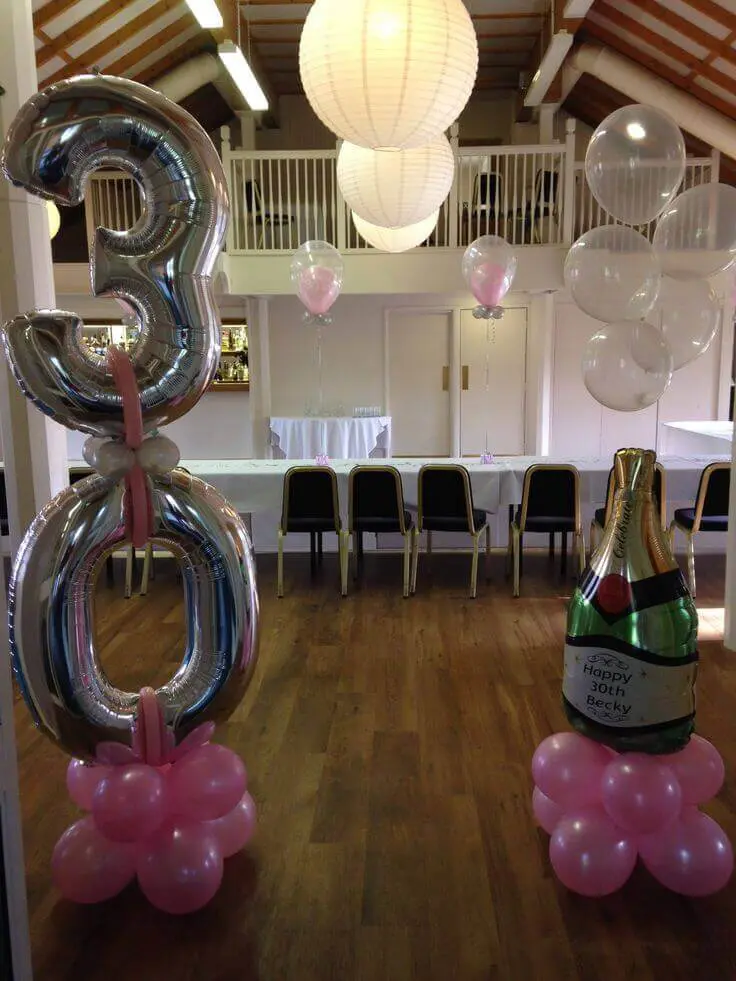 silver number 30 balloons floor bouquet with pink latex