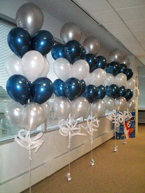 Column of blue, white, and silver latex balloons for a party delivered by Balloons Lane in Staten Island