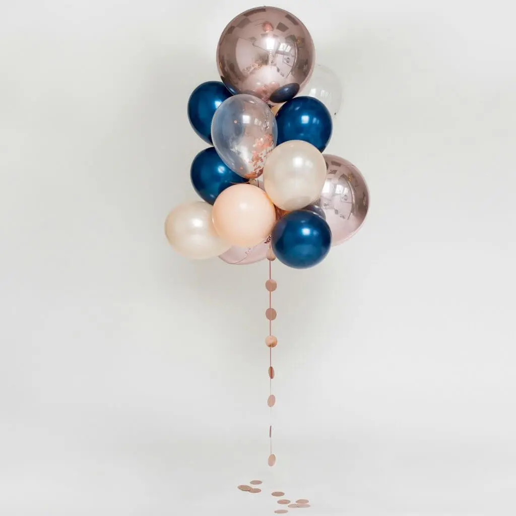 Chrome Orbz balloons in pink and blue by balloons lane with pink string