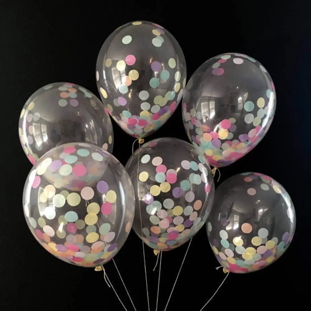 A fun and colorful display of rose, ivory, lavender, light blue, and mandarin orange confetti balloons, perfect for a birthday party celebration in New York City. These large confetti balloons are sure to create a festive atmosphere for your special occasion.
