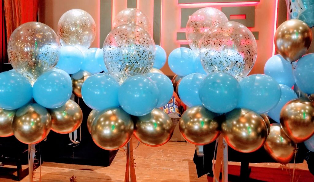 golden and light blue balloons