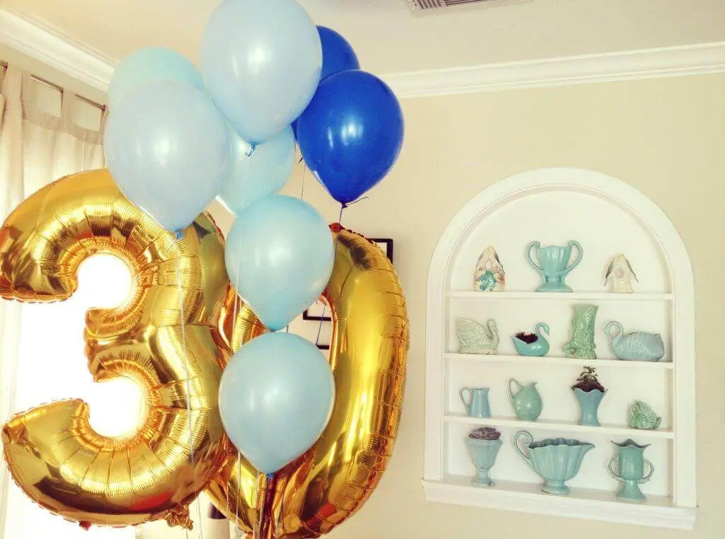 Golden, Blue and teal balloons for 30th Anniversary With number 30 in Gold