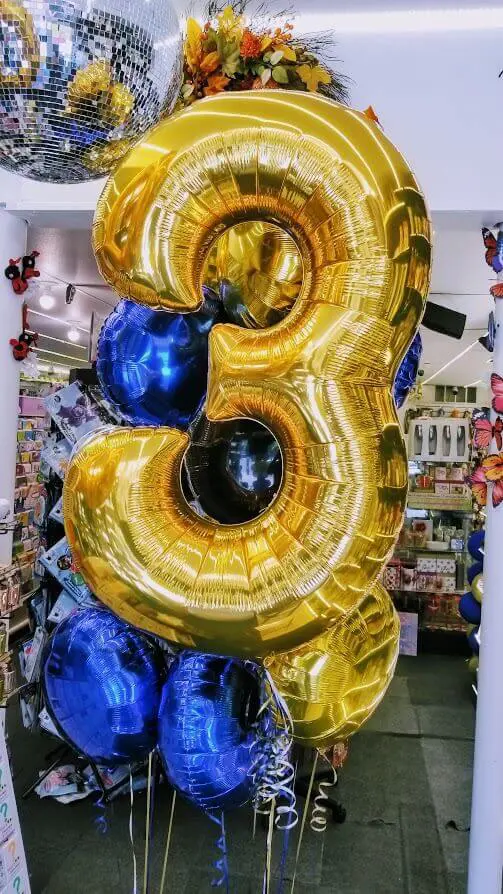 Balloons Lane Balloon delivery Soho in using colors Blue Gold and Black latex balloons helium number 3 golden balloon with Mylar balloons With number 3 in Gold for Event Party