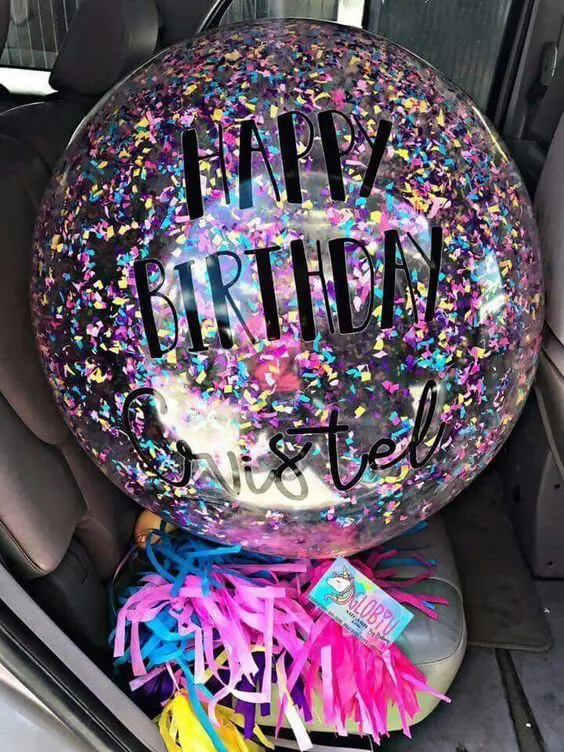 Balloon delivery uses clear jumbo balloons with color sharades multicolor confetti balloon