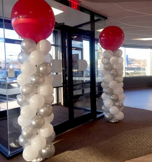 Balloons Lane Balloon delivery New York City in use colors red silver and white balloons For column Decoration