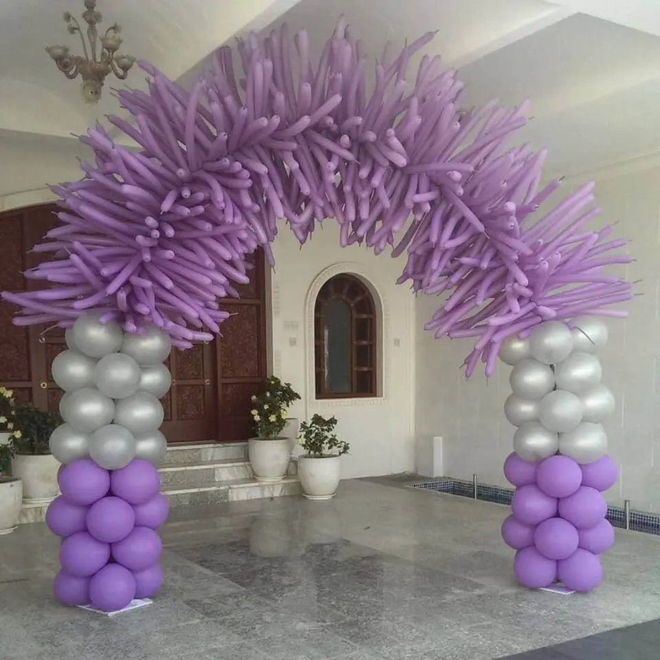A stunning arch made of Lavender and Silver tube balloons, perfect for an Anniversary celebration in Staten Island, delivered by Balloons Lane.
