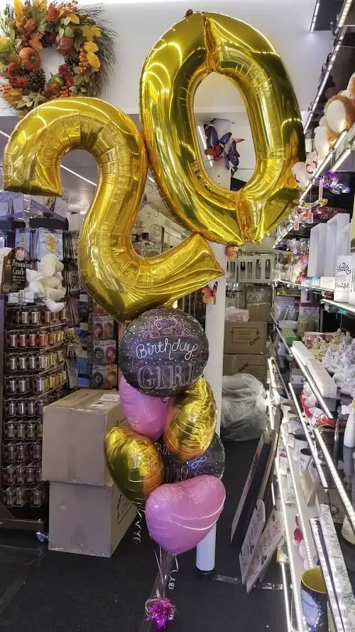 gold and pink confetti balloons and number for 20th Birthday and Anniversary Party