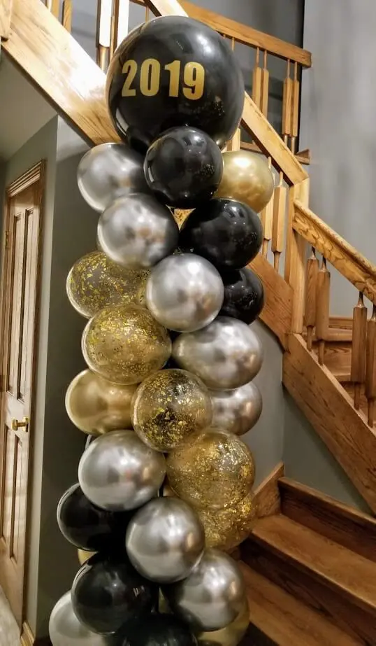 Gold, silver, black, and confetti balloon column by Balloons Lane in New Jersey for event.