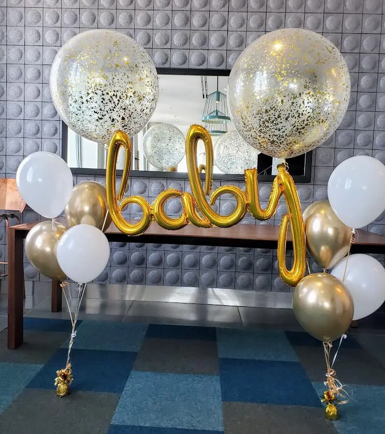 white and gold jumbo confetti balloons with letter balloon
