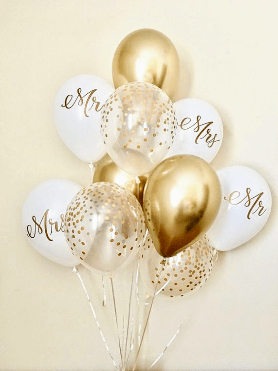 Balloons Lane in New York City offers gold and rose gold confetti wedding balloons, including a gold confetti balloon.