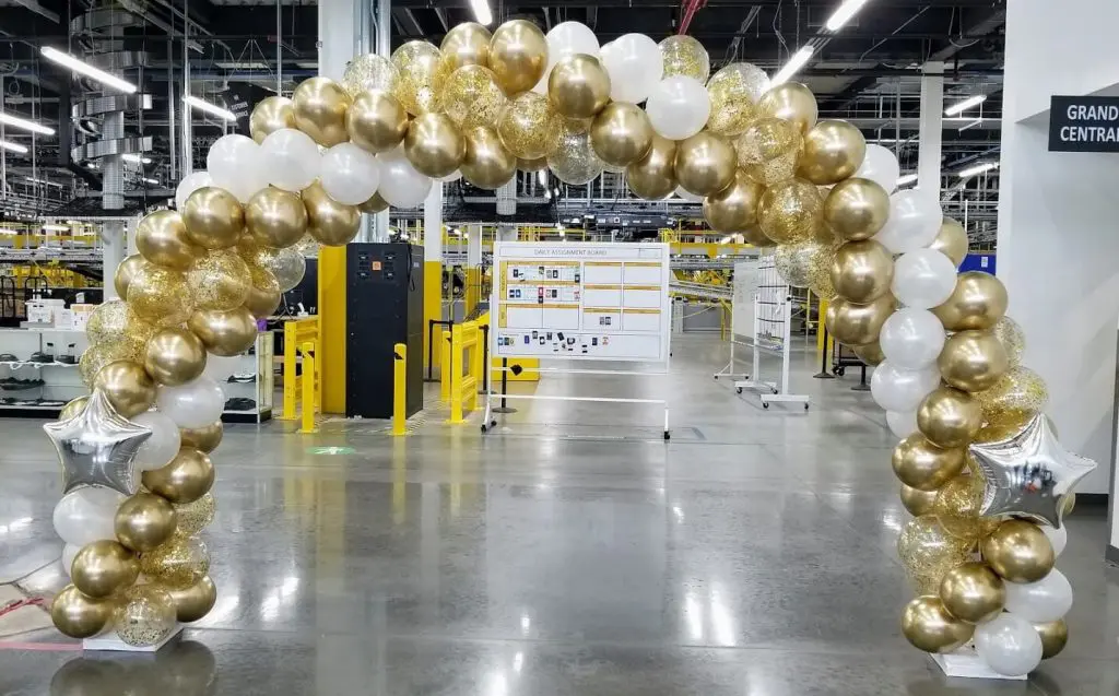 Chrome gold silver White balloons Arch for all events. The colors complement each other beautifully, creating an eye-catching display that's perfect for any celebration.