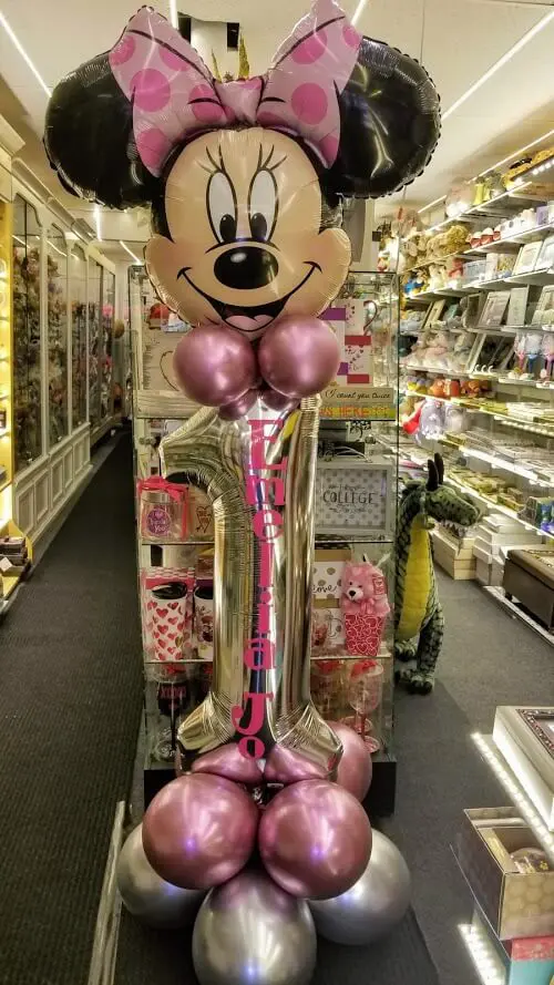Pink and silver chrome balloons, Mini Mouse 1st birthday balloon, and Number 1 balloon delivered by Balloons Lane in NJ.