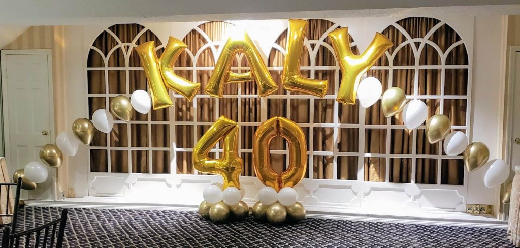 Balloons Lane Balloon delivery Soho in using colors gold and white latex Balloons name balloons Number for a Decoration party