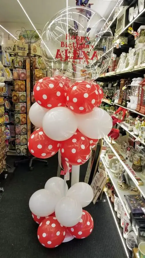 Column of white and red latex balloons for occasion decoration delivered by Balloons Lane in New York City