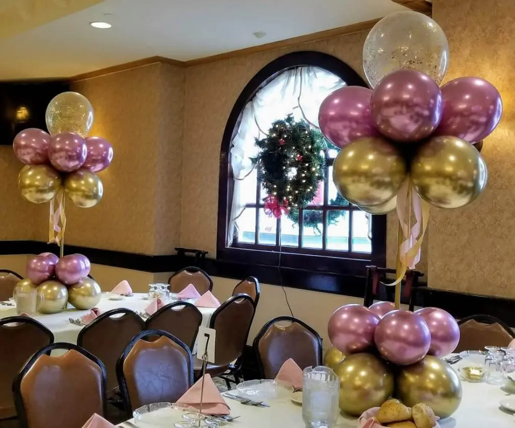 Balloons Lane colors use pink and gold latex and gold confetti balloons with shower balloons centerpieces and gold and white balloon centerpieces For Event Party