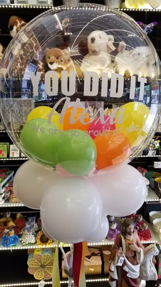 Balloon Lane in Staten Island uses the colors Green Yellow Orange Pink and White graduation gumball balloons Round with big round beautiful design balloons Mylar for Occasion Party decorations balloons