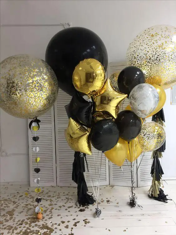 Balloon Lane uses the colors Purple confetti balloons with big clear purple balloons with big round gold Mylar star balloons round for birthday Parties