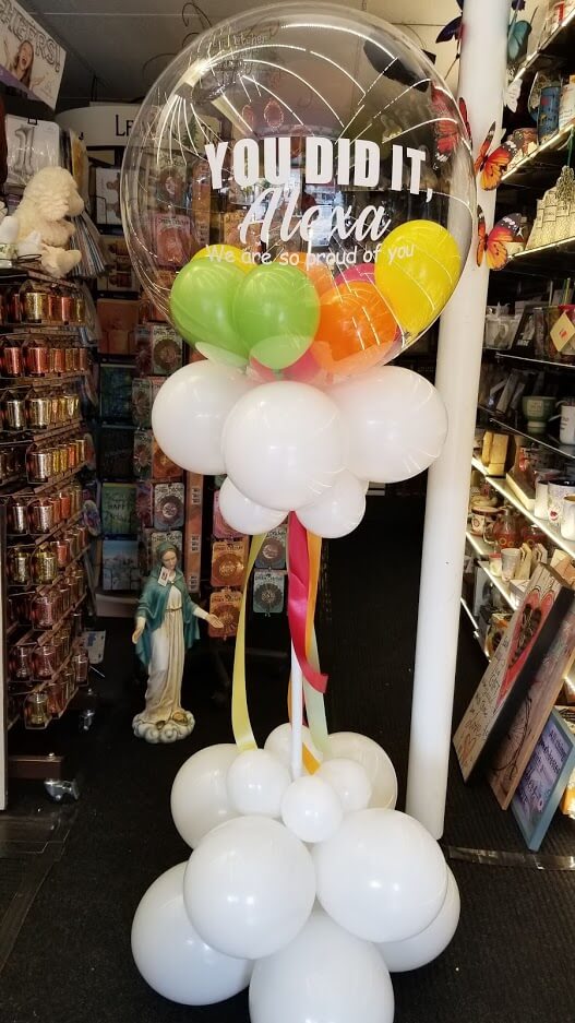 White Orange Green Yellow latex graduation balloons column with personalized message