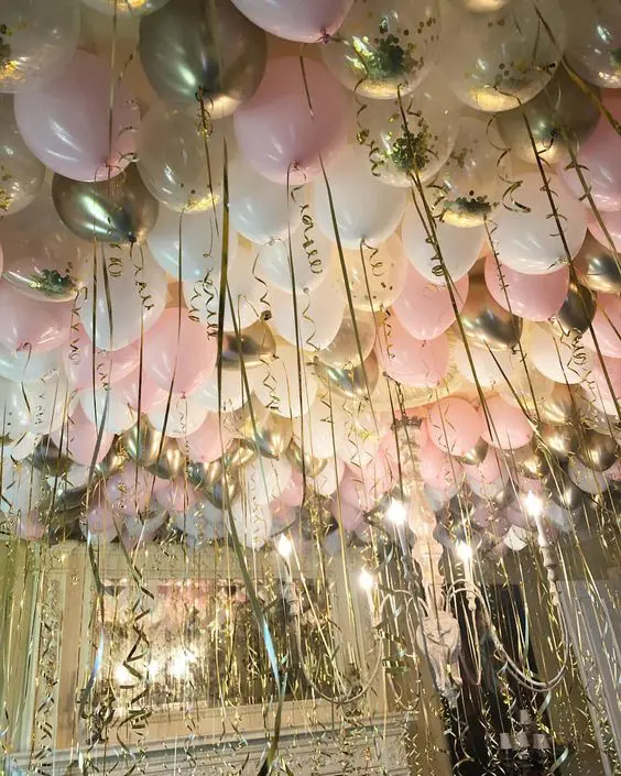 Balloon delivery uses the colors, chrome gold Pearl Pink Diamond Clear, and white ceiling balloons for valentine's balloons decorations