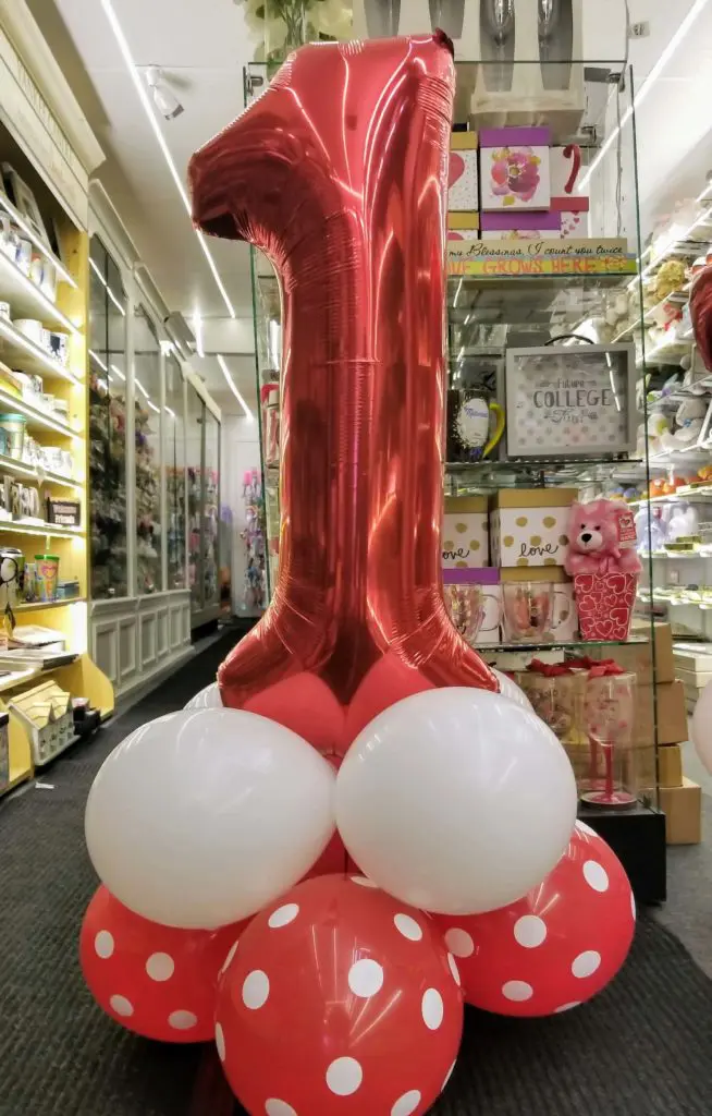 Ruby Red, White, and Red Balloon with Number 1 Balloons in a Ruby Red Column
