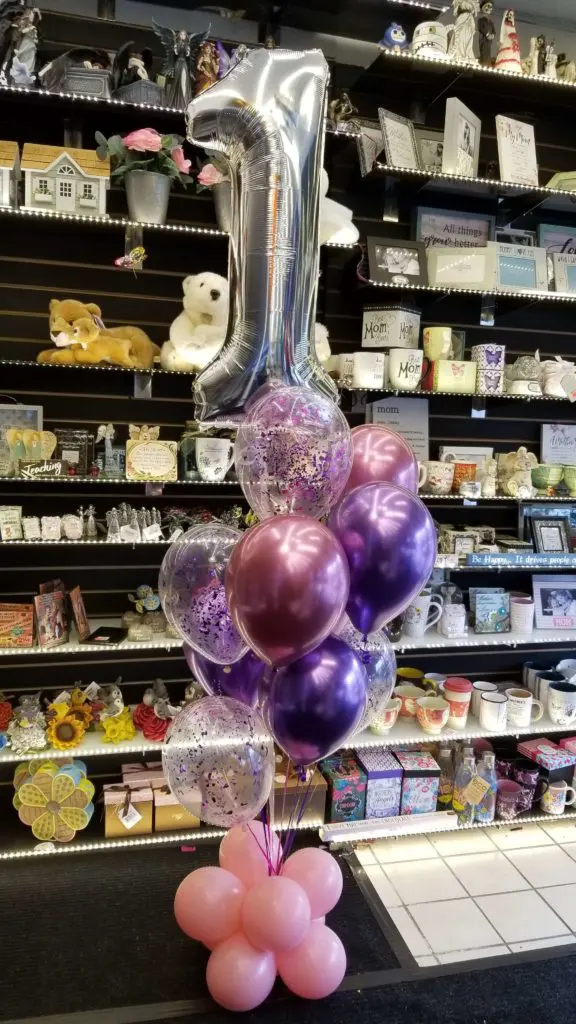 Balloon decoration in Pink, Purple, Mauve, and Silver colors, with Number 1 in Silver