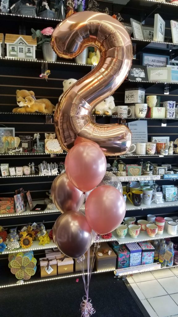 Balloons Lane Balloon delivery Brooklyn in using colors Rose Gold Pink and Chrome Rose Gold balloons With Number Balloons 1 in Gold Arch For first birthday
