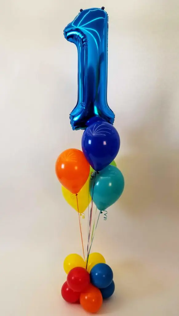 Azure, Yellow, Orange, Green, Blue, and Sapphire Blue balloon decorations with the Number Balloon 1 in Sapphire Blue Bouquet for 1st birthday celebration in NYC.