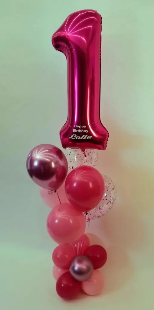 A beautiful balloon bouquet in Burgundy, Pink, Silver, and Red colors, featuring number balloons in Burgundy, perfect for a first birthday boy balloon decoration.