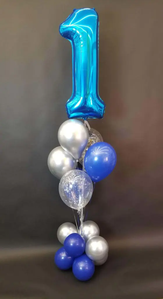Silver, Blue, and Sapphire Blue balloon decorations with Number 1 in Sapphire Blue balloons for first birthday celebration in Brooklyn.