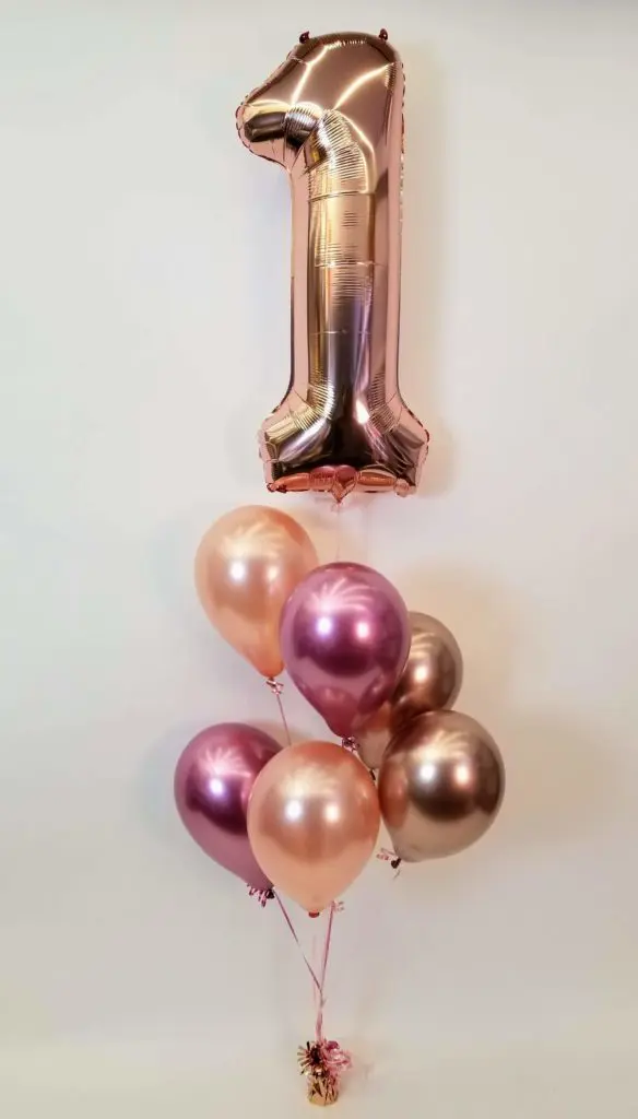 Balloons Lane using colors Chrome® Mauve Chrome® Rose Gold and Chrome Gold balloons With Number Balloons 1 in Chrome Gold Balloons Column for one balloon first birthday