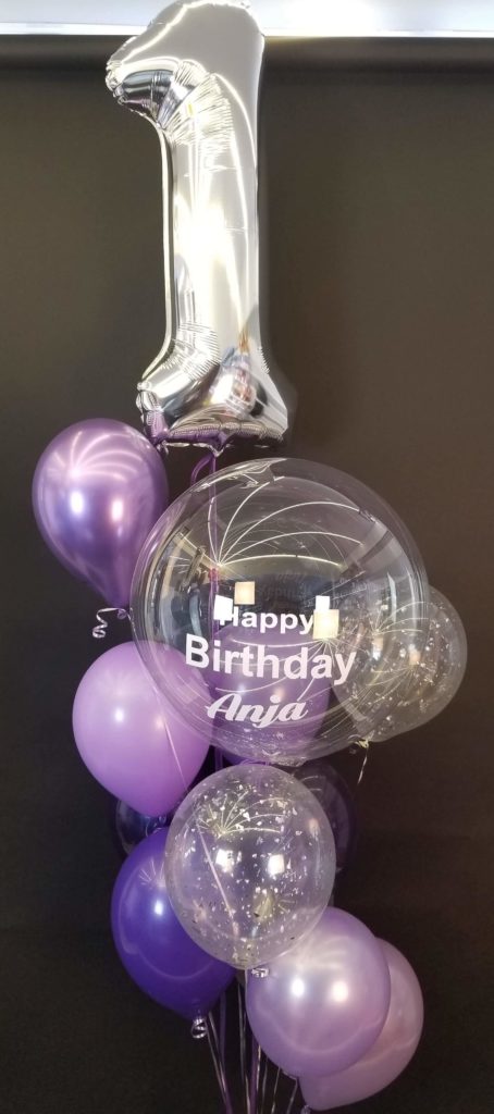 Balloons Lane Balloon delivery Staten Island in using colors Chrome Purple Pearl Lavender and Silver balloons With Number balloons 1 in Silver Centerpiece for one year old birthday