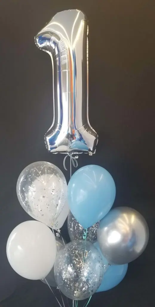 Festive azure, silver, and white balloons, with a large silver number 1 balloon