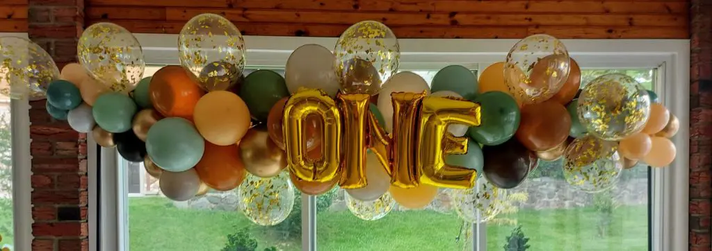 Chrome Green Black Orange White Rose Gold and Gold Balloons arrangement with Number One in Gold for First Birthday Party Balloons