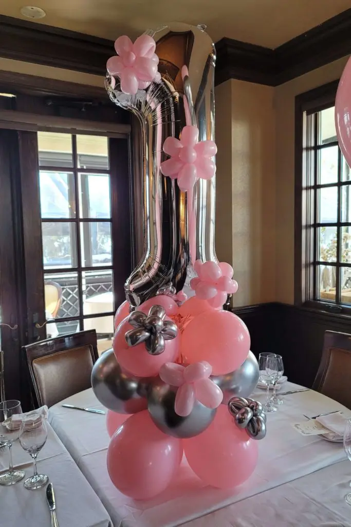 Pink and Silver Balloons with Number 1 in Silver Column