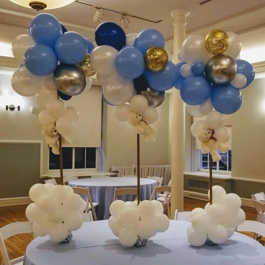 Baby's 1st birthday balloon column in White, Blue, Silver, Gold, and Navy colors, creating a delightful and celebratory atmosphere.