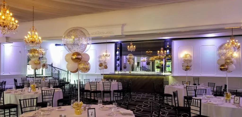 Balloons Lane's exquisite gold and white balloon centerpieces, adorned with sparkling gold confetti balloons, offer the perfect decor solution for your birthday party.