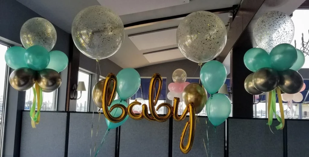 Gold, mint green, and chrome gold balloons for baby shower