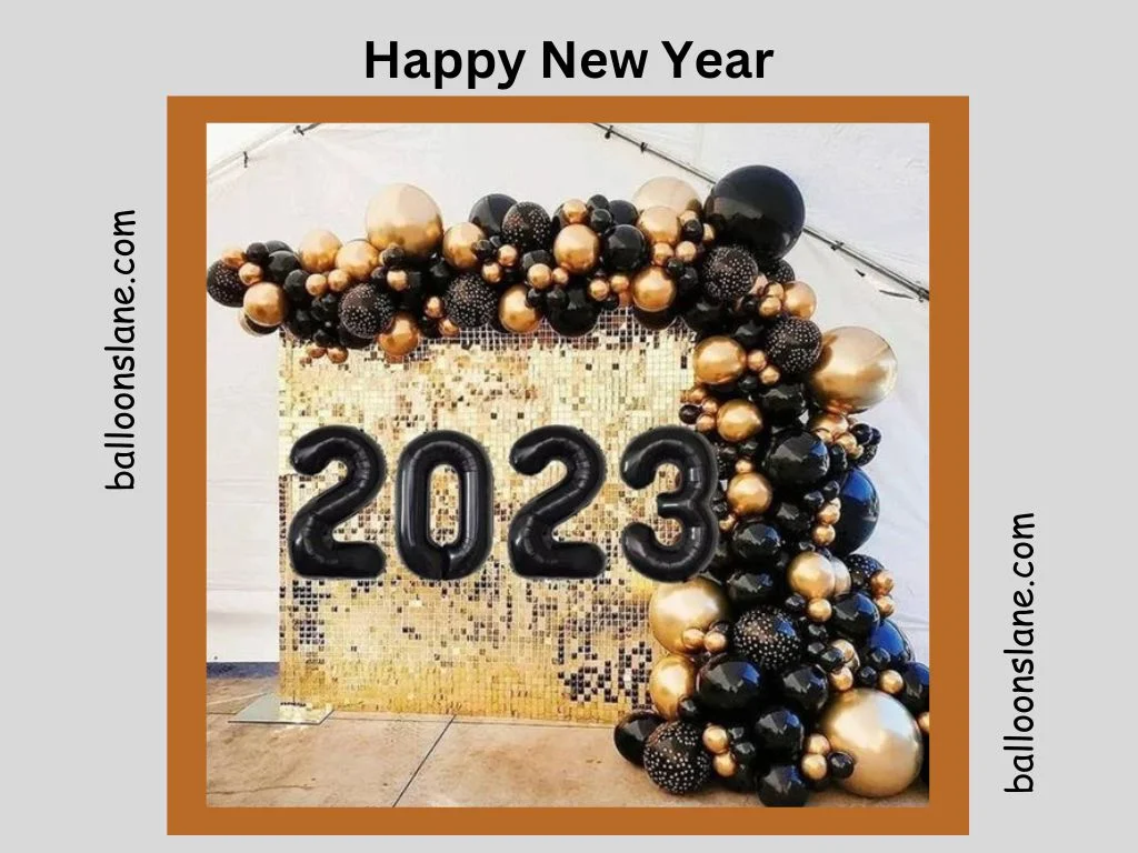 A festive arrangement of black, gold, and silver chrome balloons, including number balloons, delivered for a New Year's party in NYC.