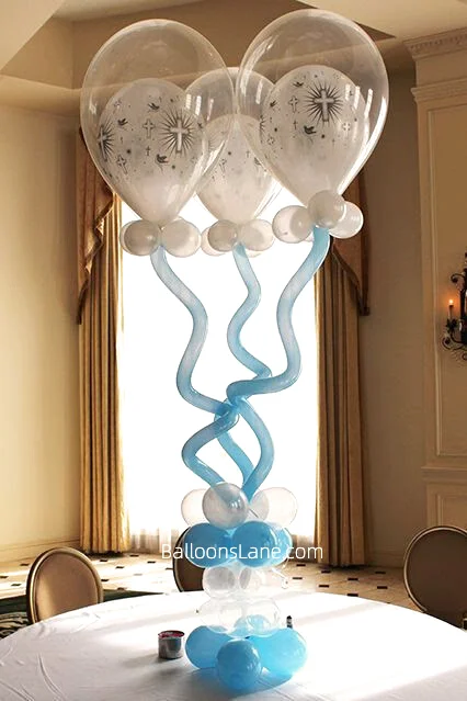 Christening balloons bouquet featuring pearl blue, white, and confetti balloons, along with clear and twisted balloons in Brooklyn.