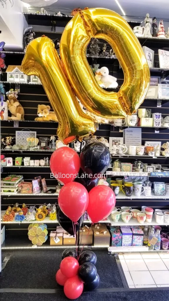 Gold 10 Number Balloons with red and black latex balloon bouquet to celebrate 10th birthday in NJ
