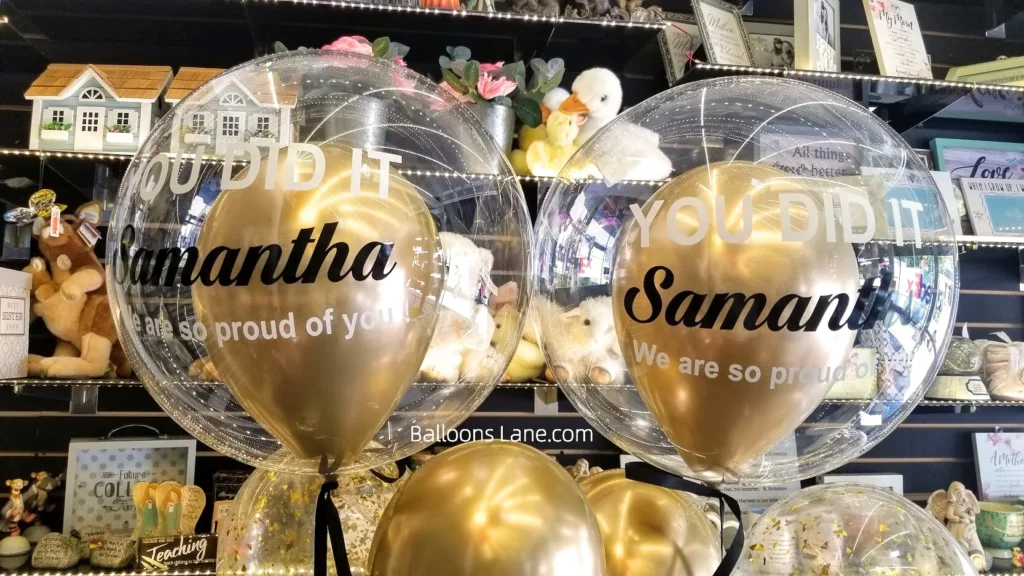 "You Did It" Customized Balloon Bouquet with Gold, White, and Black Balloons, and Gold Star Confetti in Staten Island