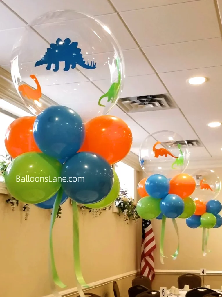 Bubble balloon with Communion theme and orange, green, red, blue, and white accents in NYC