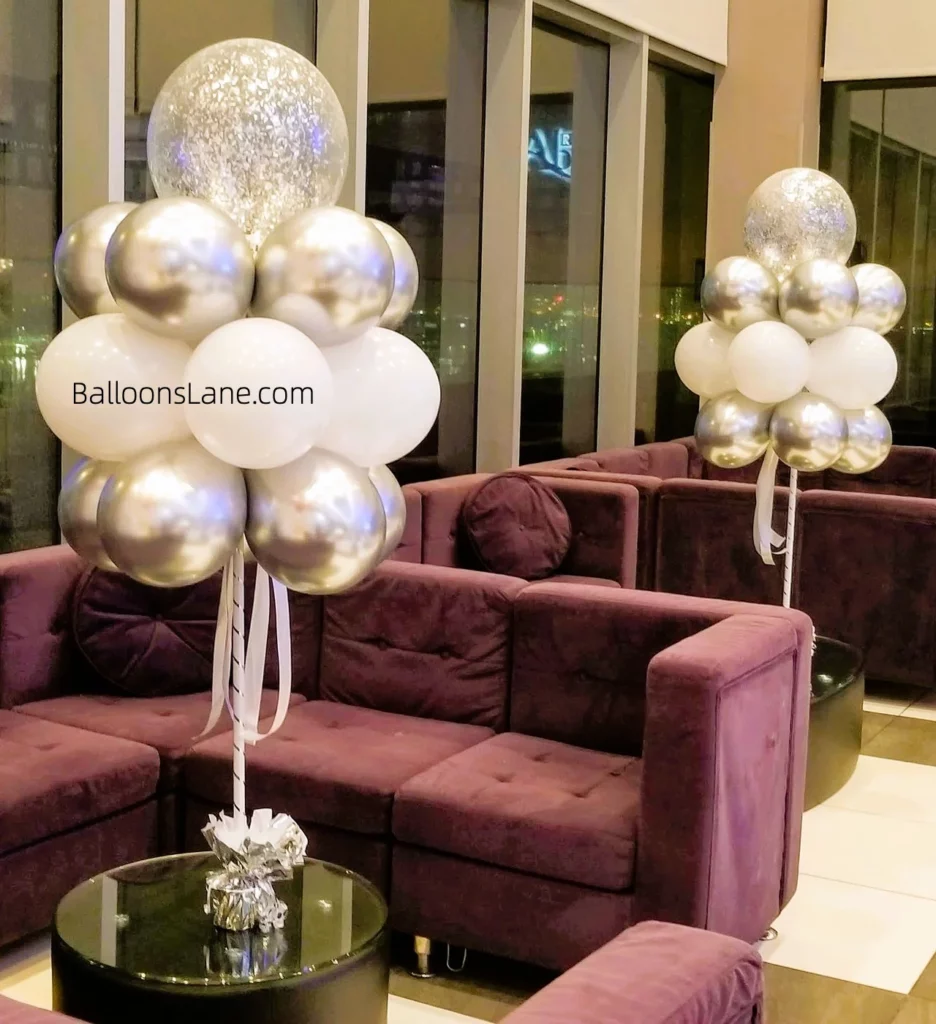 Silver confetti balloons with white and chrome silver balloon clusters to celebrate engagement in Brooklyn