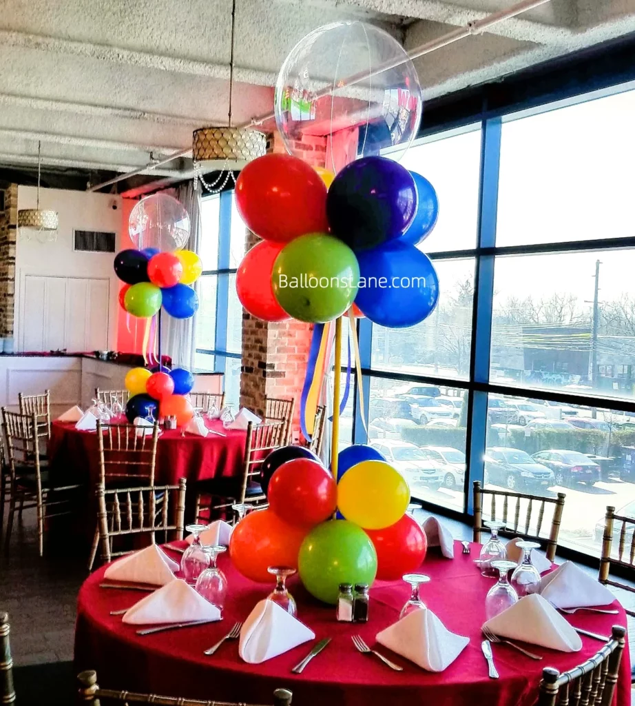 Bubble balloon with red, green, and blue balloon bouquet/centerpiece to celebrate birthday in NJ