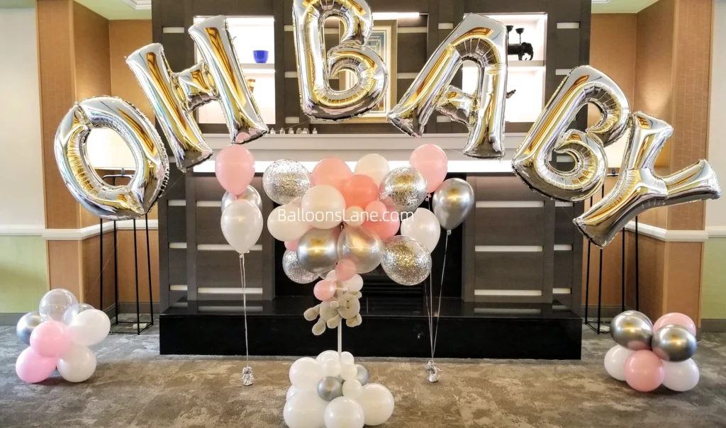 "OH BABY" Gender Reveal Balloon Decor with Silver, Pink, and Confetti Balloon Bouquet Cluster in Brooklyn for Your Special Event in NJ