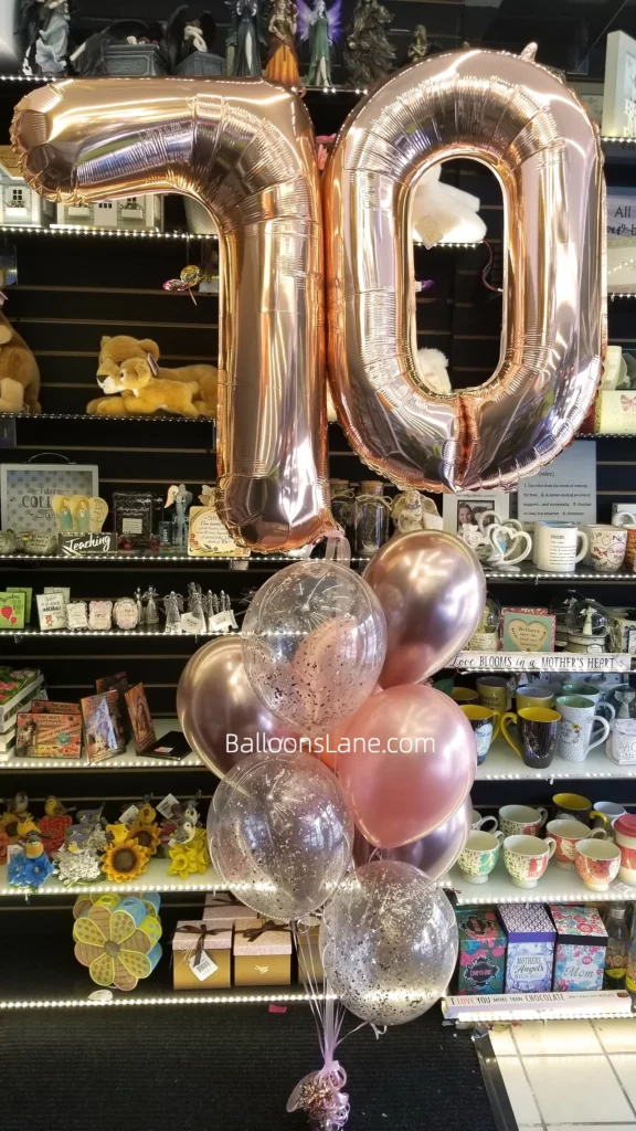 Rose Gold Number Balloon Bouquet with "70" Number Balloons and Matching Latex Balloons, Perfect for a 70th Birthday Celebration in NYC