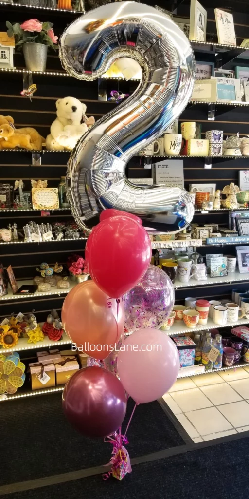 2 Silver Big Number Balloon with pink, peach, and purple confetti balloons to celebrate 2nd birthday in NYC.
